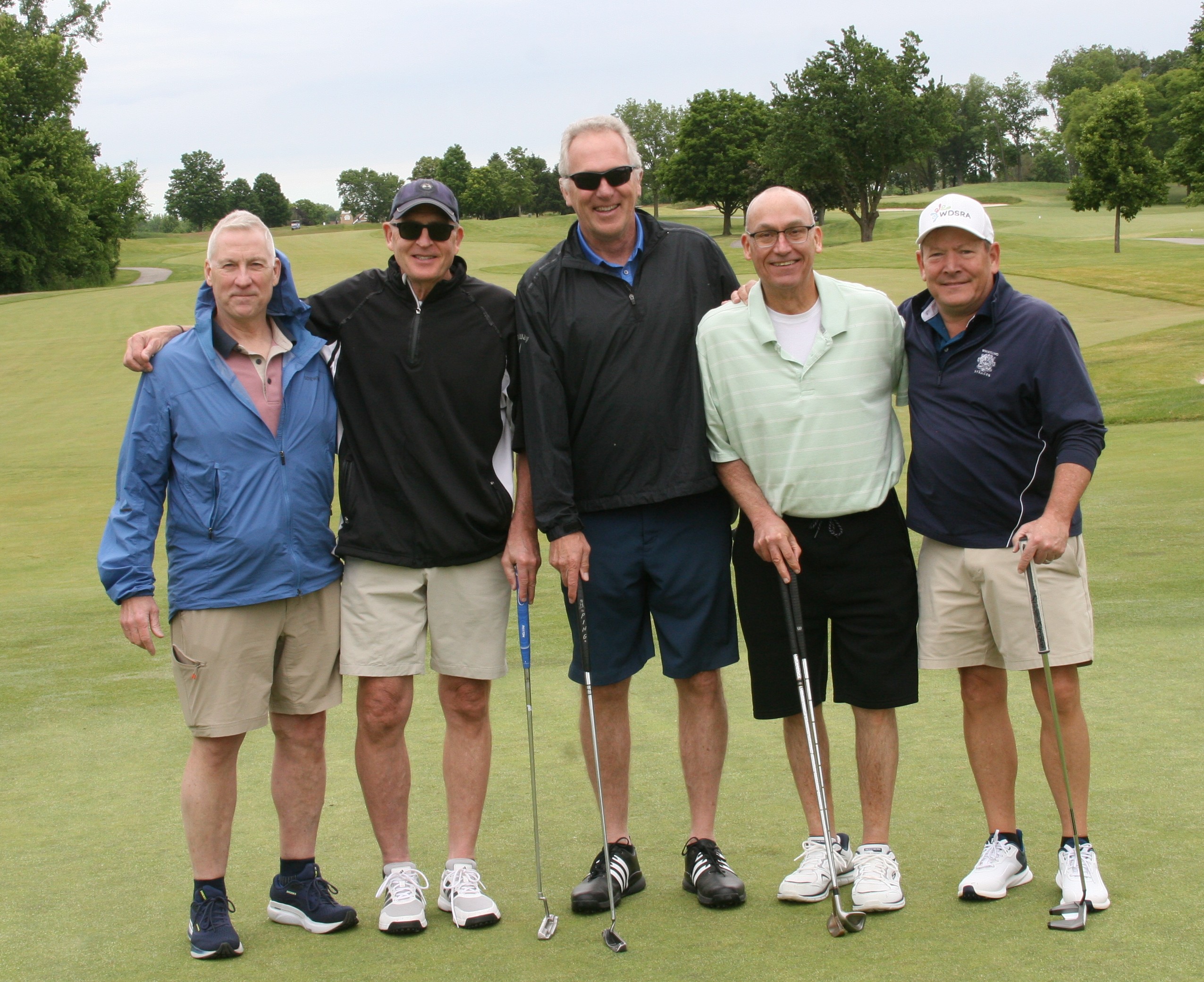 Chuck Long and his golf teammates